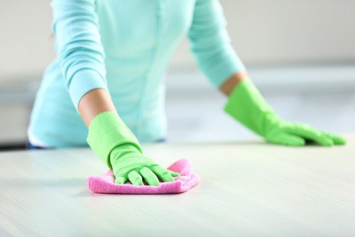 Freshly pressed garments representing professional Camden cleaner services